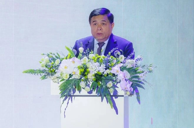Le ministre Nguyen Chi Dung a souligné les contributions positives du centre à l'établissement, au développement et à la direction de l'écosystème national d'innovation. Photo: VietnamPlus dung.jpg