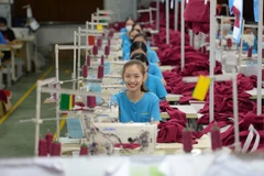 Les exportations vietnamiennes du secteur textile-habillement ont enregistré au premier semestre 2025 une croissance d'environ 11% en variation annuelle. Photo: Vietnam+