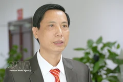 Le Van Thuy, vice-président de l’Association générale des Vietnamiens au Laos, répond à une interview de la VNA. Photo: VNA