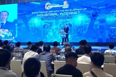 Nguyên Truong Giang, directeur adjoint du Centre d'information sur le réseau Internet du Vietnam (VNNIC), prend la parole à la conférence. Photo: VNA