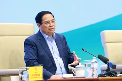 Le Premier ministre Pham Minh Chinh s'exprime au 7e Dialogue avec les agriculteurs, le 10 décembre à Hanoï. Photo: VNA