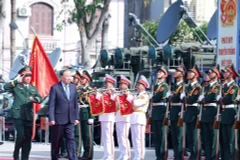 Le secrétaire général du Parti communiste du Vietnam, To Lam, participe à célébration de la Journée traditionnelle des Forces armées de la 4e zone militaire. Photo: VNA