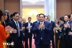 Le Premier ministre Pham Minh Chinh à la conférence annonçant la création du Centre financier international au Vietnam. Photo: VNA