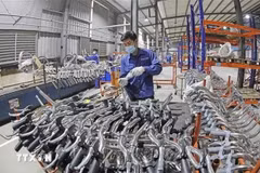 Fabrication de vélos chez la société Thong Nhat. Photo : VNA