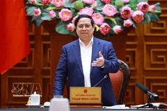 Le Premier ministre Pham Minh Chinh s'exprime lors de la réunion du 10 mars. Photo: VNA