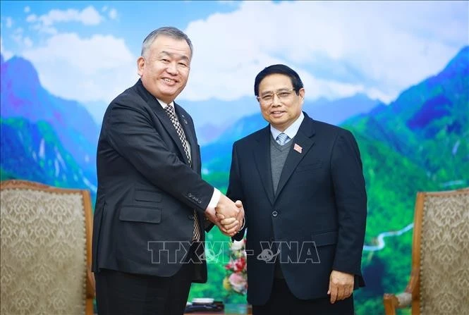 Le Premier ministre Pham Minh Chinh (droite) et le directeur général et président du Yamato Holdings, Nagao Yutaka. Photo : VNA