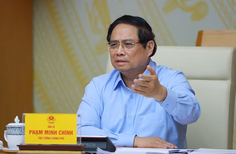 Le Premier ministre Pham Minh Chinh lors de la réunon. Photo : VNA