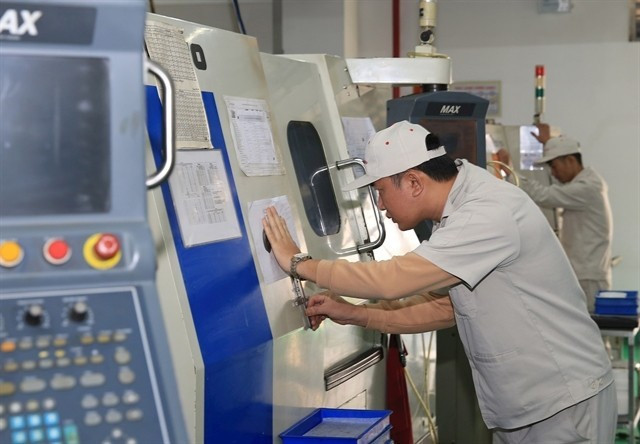 Hanoï vise environ 1 200 entreprises du secteur des industries de soutien. (Photo : thoibaonganhang.vn)