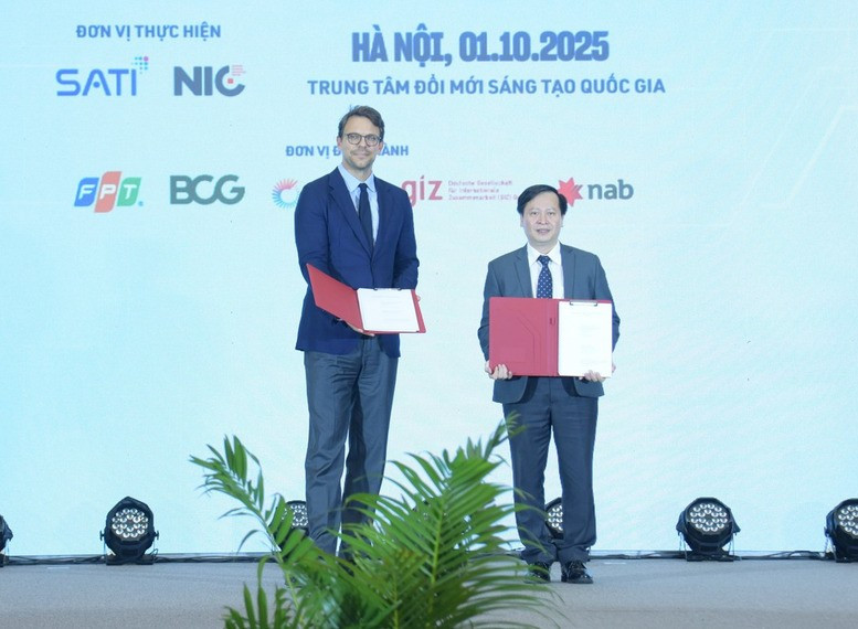 Echange d'un accord portant sur le déploiement du projet « Énergie propre, abordable et sûre pour l’Asie du Sud-Est – mise en œuvre au Vietnam » (CASE Vietnam). Photo . VNA
