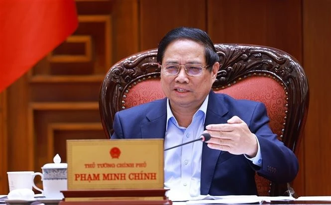 Le Premier ministre Pham Minh Chinh lors de la réunion. Photo ; VNA