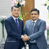 Le Premier ministre vietnamien Le Minh Hung (à gauche) et Sanjay Dhawan, vice-président du groupe ACME. Photo : VNA