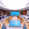 Lors de la séance de travail entre le ministre cambodgien de l’Inspection, Sok Soken et la Banque commerciale par actions pour l'investissement et le développement du Vietnam (BIDV) à Hanoï. Photo : VNA