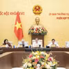 Le président de l'Assemblée nationale, Tran Thanh Man (au milieu), lors de la réunion. Photo : quochoi.vn