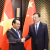 Le ministre de l'Agriculture et de l'Environnement, Trinh Viet Hung (à gauche) et le ministre chinois de l'Agriculture et des Affaires rurales, Zhang Zhu. Photo : VNA