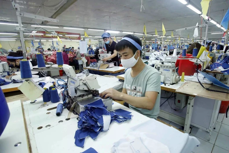 Production dans une usine. Photo: VNA