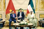 Le Premier ministre Pham Minh Chinh et l’Émir de l’État du Koweït, Cheikh Mechaal Al-Ahmad Al-Jaber Al-Sabah. Photo: VNA