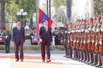 Cérémonie d’accueil officielle du président Luong Cuong en visite d’État au Laos. Photo: VNA