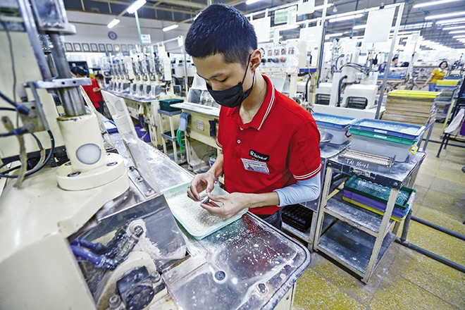 La réorganisation des unités administratives est perçue comme un « facteur clé » pour renforcer la confiance des investisseurs. Photo: dautu.vn ide-1.jpg