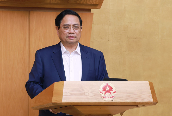 Le Premier ministre Pham Minh Chinh s'exprime à la réunion. Photo: VNA chinh-2.jpg