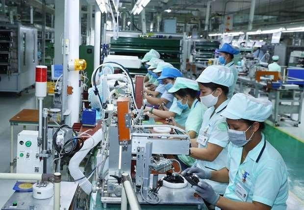 Le bilan économique des sept premiers mois illustre une reprise progressive de l’économie. Photo .Vietnam+ economie-1.jpg