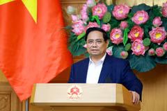 Le Premier ministre Pham Minh Chinh s'exprime lors de la réunion. Photo: VNA