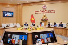Lors de la réunion. Photo : ministère vietnamien de l’Industrie et du Commerce