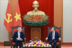 Le secrétaire général du Comité central du Parti communiste du Vietnam To Lam (droite) et le PDG du Conseil des affaires États-Unis-ASEAN, Ted Osius. Photo : VNA 
