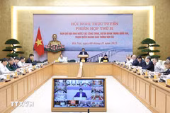 Le Premier ministre Pham Minh Chinh préside la 21e réunion du Comité national de pilotage des ouvrages et projets clés du secteur des transports. Photo: VNA