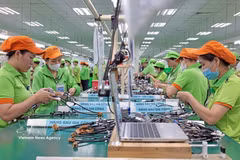 Chaîne d’assemblage des produits après transformation dans l’usine de Bandai Vietnam. Photo : VNA