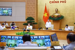 Le Premier ministre Le Minh Hung s'exprime. Photo: VNA
