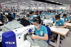 Le textile est l'un des principaux moteurs de l'ensemble du secteur industriel. Photo: VNA