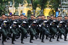 La force de la police spéciale lors de la répétition générale. Photo: VNA