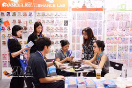 Des entreprises recherchent des opportunités de collaboration lors de ce salon. Photo: VNA