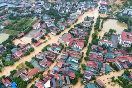 Les intempéries liées au typhon n°10 provoquent glissements de terrain et crues soudaines, faisant plusieurs morts et disparus à Cao Bang, Tuyên Quang et Lao Cai. Photo : VNA