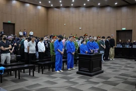 Les accusés ont écouté le verdict du Tribunal. Photo: VNA