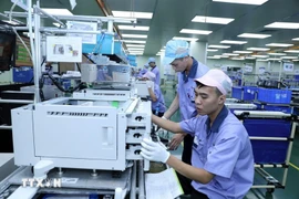 La Sarl de l’industrie de précision EVA, à capitaux hongkongais (Chine), implantée dans le parc industriel VSIP de Hai Phong, est spécialisée dans la fabrication de composants électroniques pour équipements de bureau. Photo : VNA