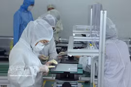 Chaîne d'assemblage d'ordinateurs portables de la Sarl Heesung Electronics Vietnam. Photo : VNA