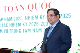 Le Premier ministre Pham Minh Chinh à la Conférence nationale visant à dresser le bilan des activités judiciaires pour la période 2021–2025. Photo: VNA
