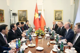 Entrevue entre le Premier ministre Pham Minh Chinh et le président polonais Andrzej Duda au palais présidentiel, à Varsovie. Photo: VNA