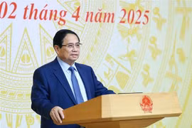 Le Premier ministre Pham Minh Chinh, chef du Comité de pilotage pour l'élaboration du projet de développement du secteur économique privé, a présidé la deuxième réunion dudit Comité de pilotage tenue dans l'après-midi du 2 avril à Hanoï. Photo : VNA