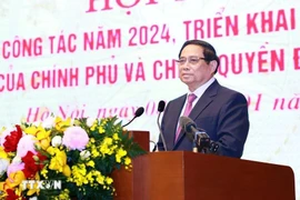 Le Premier ministre Pham Minh Chinh prend la parole lors de la conférence. Photo: VNA