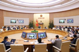 Lors de la réunion. Photo : VNA