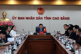 Représentants de Cao Bang lors de la réunion virturelle. Photo : VNA