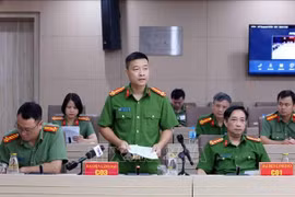 Le sous-colonel Vu Thanh Tung, chef adjoint du C03 s'exprime lors de la conférence de presse du ministère de la Sécurité publique, le 7 juillet. Photo: VNA
