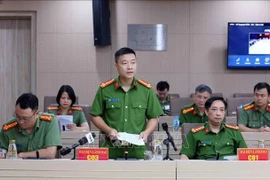 Le sous-colonel Vu Thanh Tung, chef adjoint du C03 s'exprime lors de la conférence de presse du ministère de la Sécurité publique, le 7 juillet. Photo: VNA