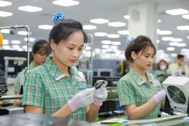 Les investissements directs étrangers réalisés au Vietnam au cours des sept premiers mois de cette année sont estimés à 13,6 milliards de dollars, soit une hausse de 8,4 % par rapport à la même période de l'année dernière. Photo : Vietnam+