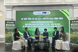 Des experts échangent leurs points de vue lors du séminaire multipartite intitulé « Promouvoir l’accès au financement vert pour les entreprises agricoles pratiquant les critères ESG ». Photo : VNA