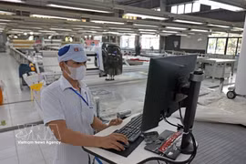 Le textile-habillement à l’export, l’un des secteurs contribuant à la croissance. Photo: VNA