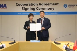 Vu Viet Trang, directrice générale de la VNA, et Hwang Dae Il, président de Yonhap lors de la cérémonie de signature. Photo : VNA