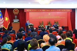 Le Premier ministre Pham Minh Chinh rencontre la communauté vietnamienne en Malaisie. Photo: VNA
